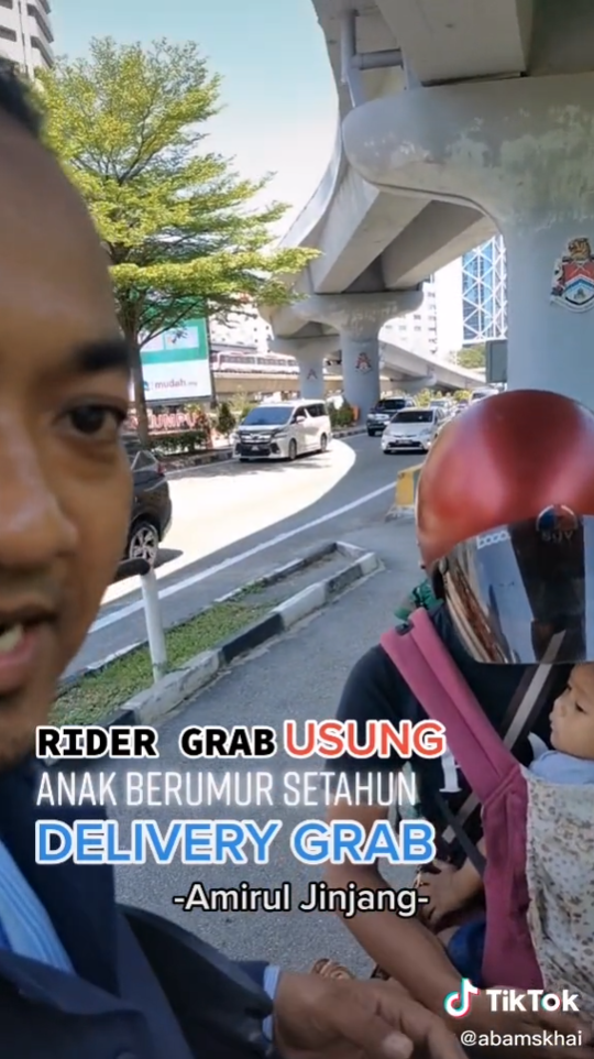 rider grab gendong anak