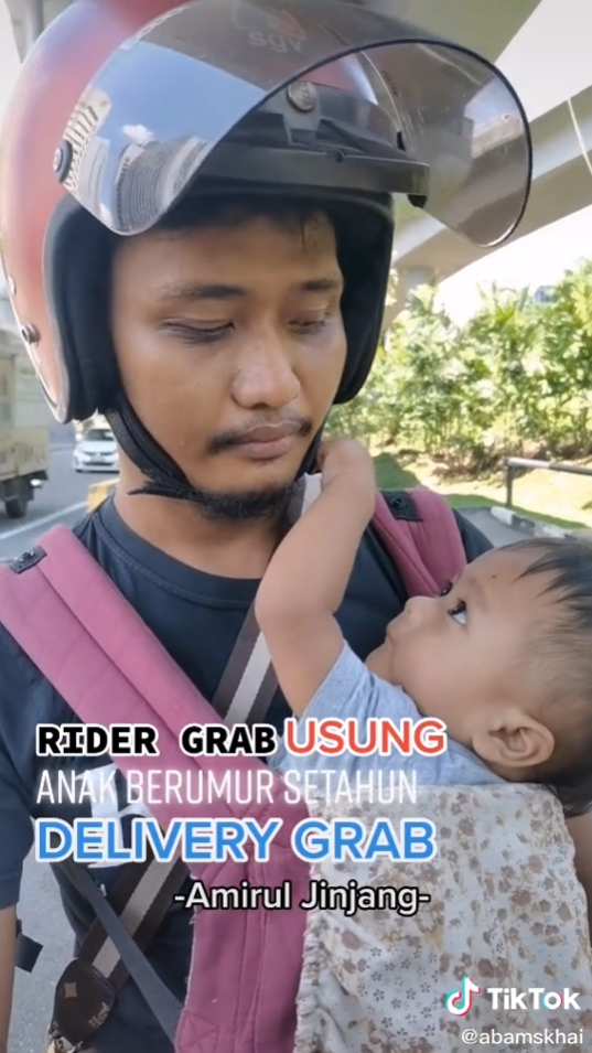 rider grab gendong anak